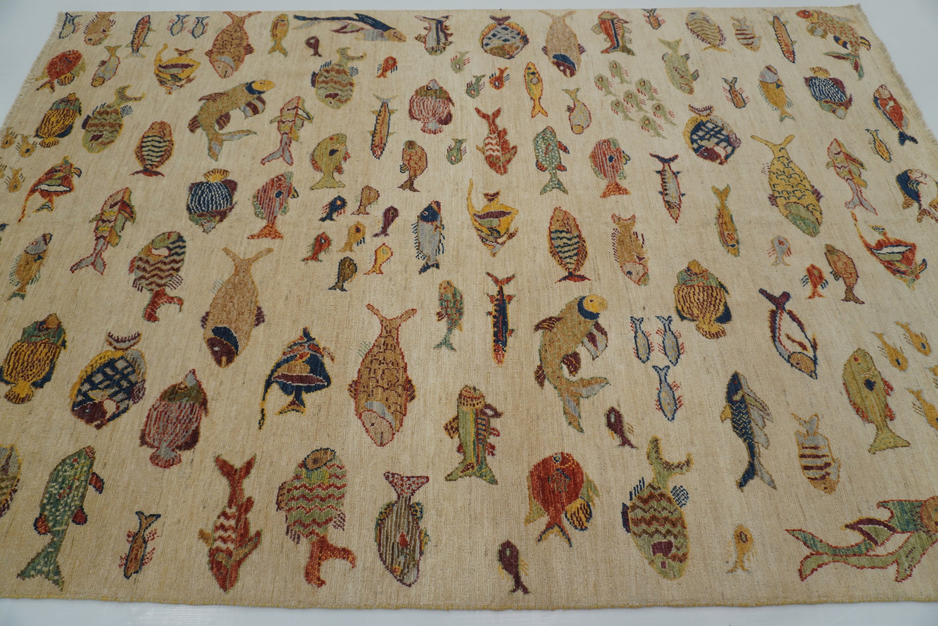 5'5"x7'11" Beige Fish Afghan Hand Knotted Rug